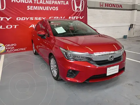 Honda City Touring usado (2022) color Rojo financiado en mensualidades(enganche $73,400 mensualidades desde $7,095)