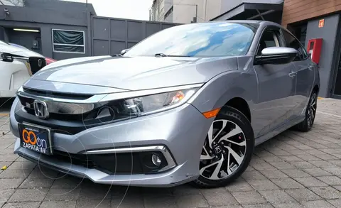 Honda Civic i-Style Aut usado (2021) color plateado financiado en mensualidades(enganche $106,275 mensualidades desde $8,127)