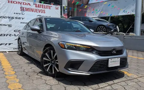 Honda Civic i-Style usado (2022) color plateado financiado en mensualidades(enganche $158,000 mensualidades desde $6,947)