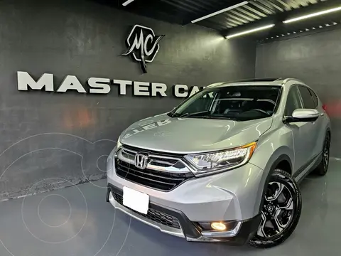 Honda CR-V Touring usado (2019) color plateado precio $365,000