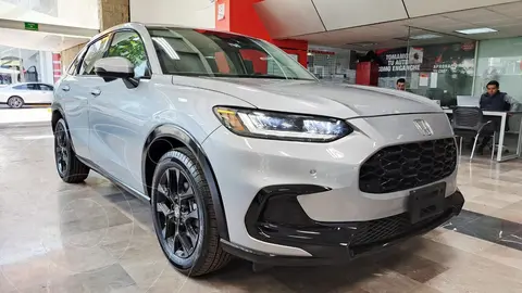 Honda HR-V Touring usado (2025) color plateado financiado en mensualidades(enganche $233,662 mensualidades desde $9,831)
