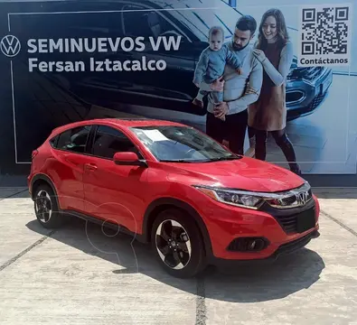 Honda HR-V Prime usado (2022) color Rojo Milano financiado en mensualidades(enganche $85,000 mensualidades desde $11,800)