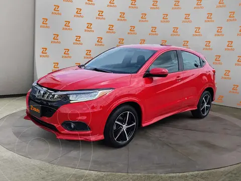 Honda HR-V Touring Aut usado (2022) color Rojo financiado en mensualidades(enganche $103,795 mensualidades desde $7,940)