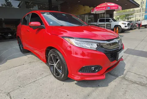 Honda HR-V Touring Aut usado (2020) color Rojo Milano financiado en mensualidades(enganche $110,500 mensualidades desde $11,658)