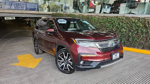 Honda Pilot Touring usado (2019) color Rojo precio $560,900