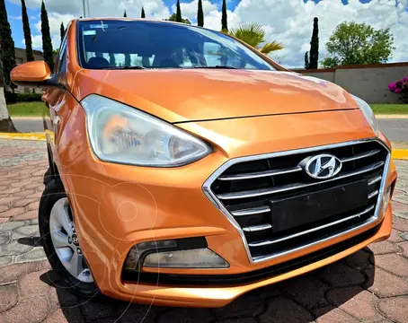 Hyundai Grand i10 Sedan GLS usado (2018) color Naranja precio $190,000