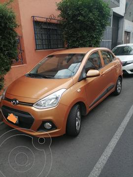 Hyundai Grand i10 Sedan GLS usado (2016) color Naranja precio $126,000
