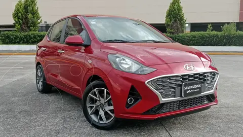 Hyundai Grand i10 Sedan GLS usado (2022) color Rojo financiado en mensualidades(enganche $54,674 mensualidades desde $6,291)