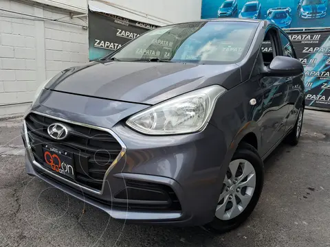 Hyundai Grand i10 GL MID Aut usado (2018) color Gris financiado en mensualidades(enganche $57,225 mensualidades desde $4,376)