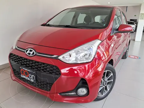 Hyundai Grand i10 GL MID usado (2019) color Rojo financiado en mensualidades(enganche $60,000 mensualidades desde $4,350)