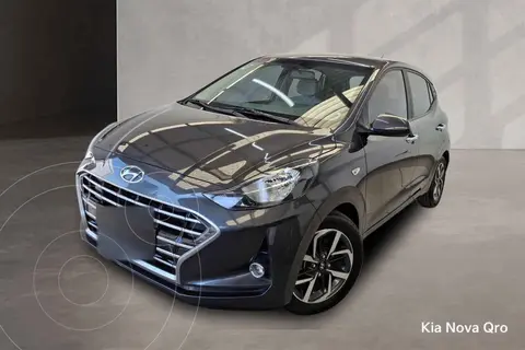 Hyundai Grand i10 GLS Aut usado (2021) color Gris financiado en mensualidades(enganche $56,952 mensualidades desde $4,889)