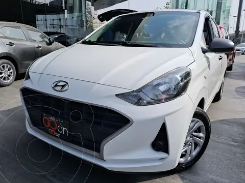 Hyundai Grand i10 MID usado (2022) color Blanco financiado en mensualidades(enganche $55,862 mensualidades desde $4,272)