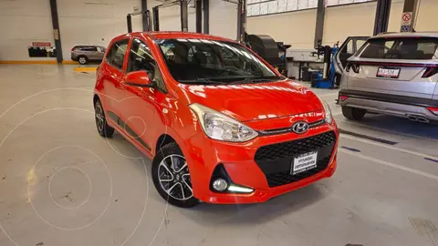 Hyundai Grand i10 GLS Aut usado (2019) color Naranja precio $225,900