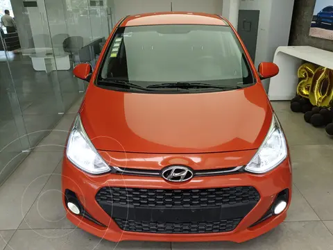 Hyundai Grand i10 GLS Aut usado (2019) color Naranja precio $189,000