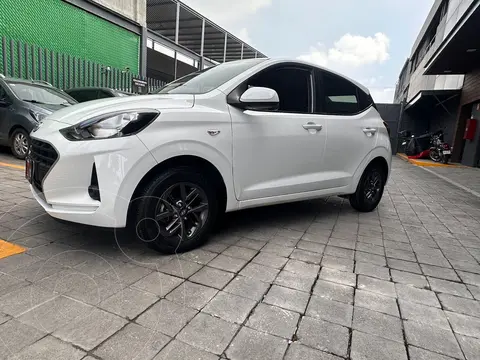 Hyundai Grand i10 MID usado (2022) color Blanco financiado en mensualidades(enganche $68,125 mensualidades desde $5,209)