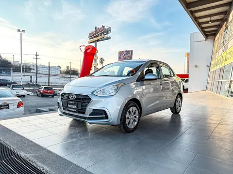 Hyundai Grand i10 GL MID usado (2019) color plateado financiado en mensualidades(enganche $39,380 mensualidades desde $4,030)