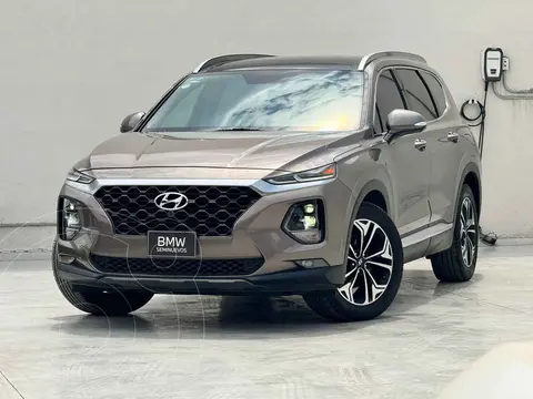 Hyundai Santa Fe V6 Limited Tech usado (2019) color Dorado financiado en mensualidades(enganche $95,800 mensualidades desde $7,472)