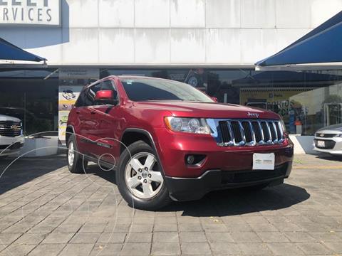 foto Jeep Grand Cherokee Laredo 4x2 3.6L V6 usado (2012) color Rojo Cobrizo precio $210,000