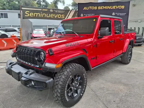 Jeep JT Willys usado (2024) color Rojo financiado en mensualidades(enganche $188,000 mensualidades desde $26,447)