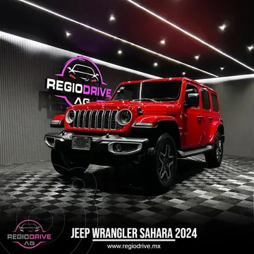 Jeep Wrangler Unlimited Sahara usado (2024) color Rojo Flama financiado en mensualidades(enganche $315,000 mensualidades desde $19,785)
