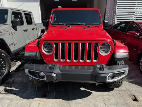 Jeep Wrangler Unlimited Sahara usado (2022) color Rojo financiado en mensualidades(enganche $180,000 mensualidades desde $24,965)