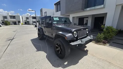 Jeep Wrangler Sahara 4x4 3.6L Aut usado (2016) color Gris precio $420,000