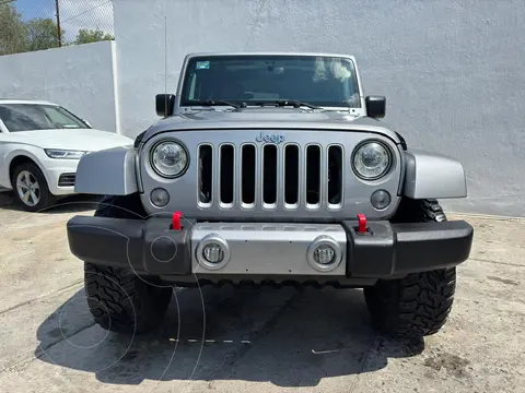 Jeep Wrangler Sahara 4x4 3.6L Aut usado (2017) color Plata financiado en mensualidades(enganche $49,900 mensualidades desde $16,600)