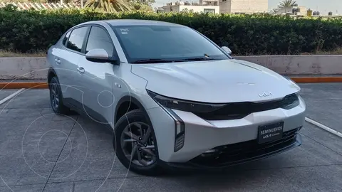 Kia K3 LX usado (2024) color Gris financiado en mensualidades(enganche $68,354 mensualidades desde $7,865)