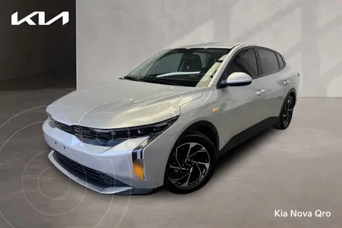Kia K3 EX usado (2024) color Plata financiado en mensualidades(enganche $91,015 mensualidades desde $7,813)