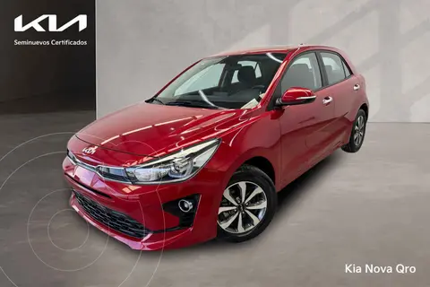 Kia Rio Hatchback EX usado (2023) color Rojo financiado en mensualidades(enganche $83,112 mensualidades desde $7,135)