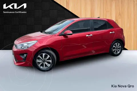 Kia Rio Hatchback EX Aut usado (2023) color Rojo financiado en mensualidades(enganche $80,000 mensualidades desde $5,850)