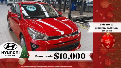 Kia Rio Sedan L  Aut usado (2023) color Rojo financiado en mensualidades(enganche $91,918 mensualidades desde $3,867)