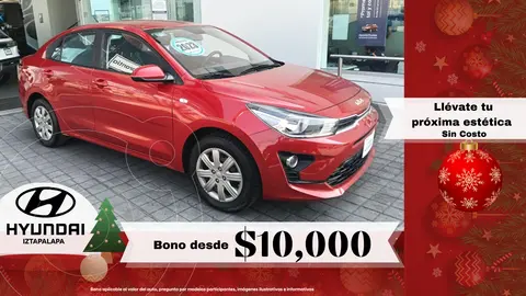 Kia Rio Sedan L  Aut usado (2023) color Rojo financiado en mensualidades(enganche $91,918 mensualidades desde $3,867)