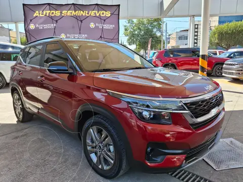 Kia Seltos EX Pack usado (2022) color Rojo financiado en mensualidades(enganche $72,573 mensualidades desde $8,279)