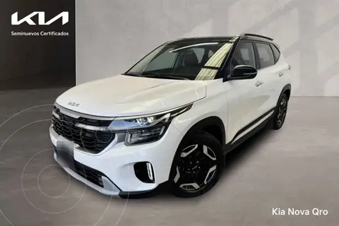 Kia Seltos SXL usado (2024) color Blanco financiado en mensualidades(enganche $121,262 mensualidades desde $10,410)