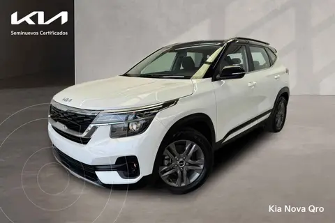 Kia Seltos EX Pack usado (2023) color Blanco financiado en mensualidades(enganche $102,188 mensualidades desde $8,772)