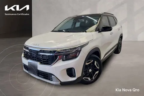 Kia Seltos SXL usado (2024) color Blanco financiado en mensualidades(enganche $121,262 mensualidades desde $10,410)