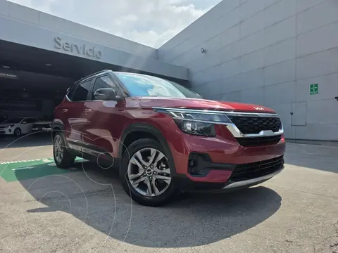 Kia Seltos EX Pack usado (2023) color Rojo financiado en mensualidades(enganche $91,200 mensualidades desde $10,494)