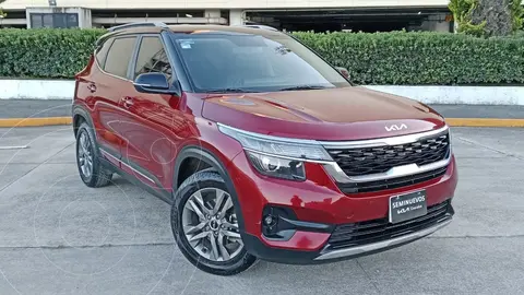 Kia Seltos EX Pack usado (2023) color Rojo financiado en mensualidades(enganche $102,554 mensualidades desde $11,800)