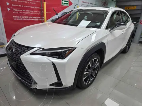 Lexus UX Hybrid 300 usado (2025) color Blanco financiado en mensualidades(enganche $170,500 mensualidades desde $16,820)