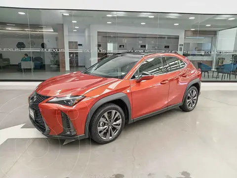 Lexus UX 250h F-Sport usado (2024) color Naranja financiado en mensualidades(enganche $333,289 mensualidades desde $15,138)