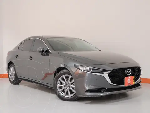 Mazda 3 Sedan hybrid 2.0L Touring MHEV usado (2023) color Gris Meteoro precio $92.990.000
