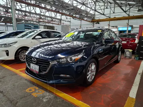 Mazda 3 Sedan i Touring usado (2018) color Azul Marino financiado en mensualidades(enganche $56,600 mensualidades desde $5,100)