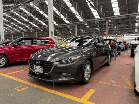 Mazda 3 Sedan i Aut usado (2018) color Gris Titanio financiado en mensualidades(enganche $56,500 mensualidades desde $5,100)