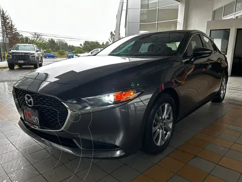 Mazda 3 Sedan i usado (2023) color Gris financiado en mensualidades(enganche $99,462 mensualidades desde $7,606)