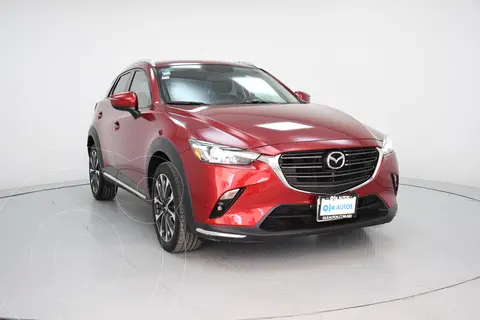 Mazda CX-3 i Grand Touring usado (2019) color Rojo financiado en mensualidades(enganche $75,000 mensualidades desde $5,900)