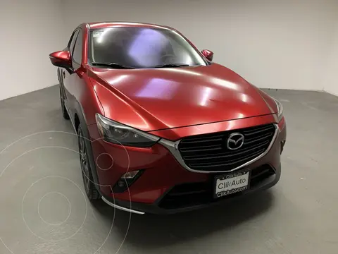 Mazda CX-3 i Grand Touring usado (2021) color Rojo financiado en mensualidades(enganche $65,000 mensualidades desde $10,100)