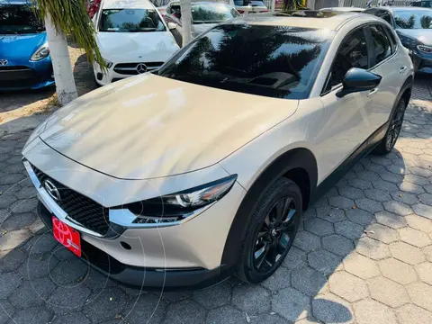 Mazda CX-30 Signature usado (2023) color Beige financiado en mensualidades(enganche $116,369 mensualidades desde $10,336)