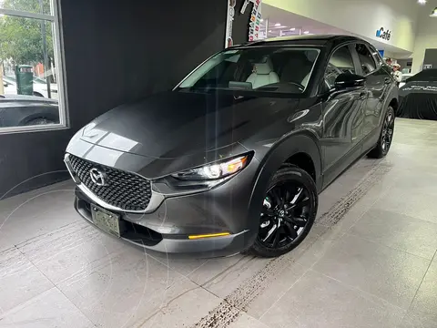 Mazda CX-30 Signature usado (2024) color Gris financiado en mensualidades(enganche $143,062 mensualidades desde $10,940)