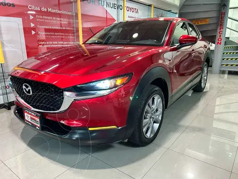 Mazda CX-30 i Sport usado (2023) color Rojo financiado en mensualidades(enganche $91,322 mensualidades desde $9,009)